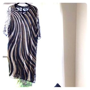 Silk dress, it's black ,gold and white.